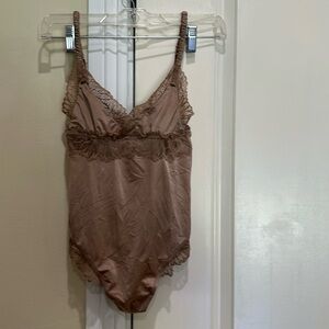 Abercrombie & Fitch gorgeous body suit in new condition.  Beautiful design. .